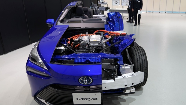 A cutaway model of the Toyota Motor Corp. Mirai fuel cell electric vehicle (FCEV) during a media event at the company's showroom in Tokyo, Japan, on Wednesday, Dec. 9, 2020. The second generation of Toyota's hydrogen FCEV allows a 30% increase in it's driving range to around 650 km, according to the company.