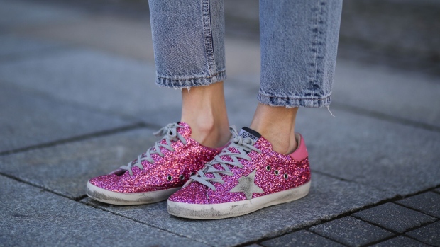 BERLIN, GERMANY - MARCH 22: Mandy Bork Zara destroyed jeans and sparkling pink Golden Goose sneakers on March 22, 2021 in Berlin, Germany. (Photo by Jeremy Moeller/Getty Images) Photographer: Jeremy Moeller/Getty Images Europe