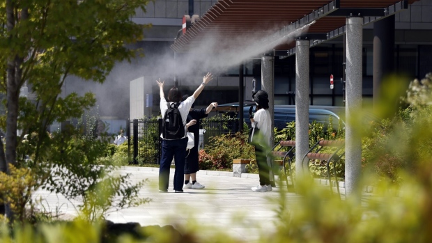 Cooling mist sprays used in Tokyo during last summer’s heatwave.