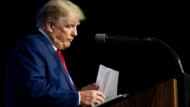 HOUSTON, TEXAS - MAY 27: Former U.S. President Donald Trump prepares to read the names of the victims of the Uvalde mass shooting during the National Rifle Association (NRA) annual convention on May 27, 2022 in Houston, Texas. The annual National Rifle Association comes days after the mass shooting in Uvalde, Texas which left 19 students and 2 adults dead, with the gunman fatally shot by law enforcement officers. (Photo by Brandon Bell/Getty Images)