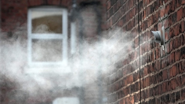 NORTHWICH, UNITED KINGDOM - FEBRUARY 03: A gas powered domestic heating and hot water boiler flue emits steam vapour from a home on February 03, 2022 in Northwich, United Kingdom. The energy regulator OFGEM has brought forward the announcement of the increase in the energy price cap to reflect the record high gas energy market prices caused by the global crisis in supply. (Photo by Christopher Furlong/Getty Images)