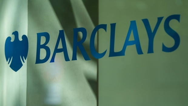 A logo at the entrance to the Barclays Plc French headquarters in Paris, France, on Wednesday, May 17, 2023. Barclays Plc expects to increase its headcount in Paris by about two thirds in the next two to three years, as the French capital increasingly becomes the main trading hub in continental Europe for global lenders after Brexit. Photographer: Nathan Laine/Bloomberg