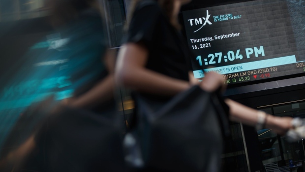 A pedestrian passes in front of the Toronto Stock Exchange in the financial district of Toronto, Ontario, Canada, on Thursday, Sept 16, 2021. Oil jumped to the highest in six weeks amid signs of a rapidly tightening market after a U.S. government report showed a bigger-than-expected decline in crude stockpiles.