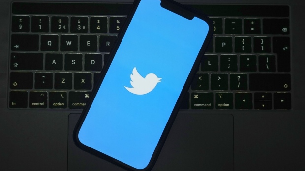 KNUTSFORD, UNITED KINGDOM APRIL 21: In this photo illustration the Twitter logo is seen on a mobile cellphone on April 21, 2023 in Knutsford, United Kingdom. The social media company started removing large numbers of the blue verification check marks, or "blue ticks," that had historically indicated a verified account. The company said in a statement that they are "removing legacy verified checkmarks" and, to remain verified on Twitter, users can sign up for the paid Twitter Blue subscription. (Photo illustration by Christopher Furlong/Getty Images)