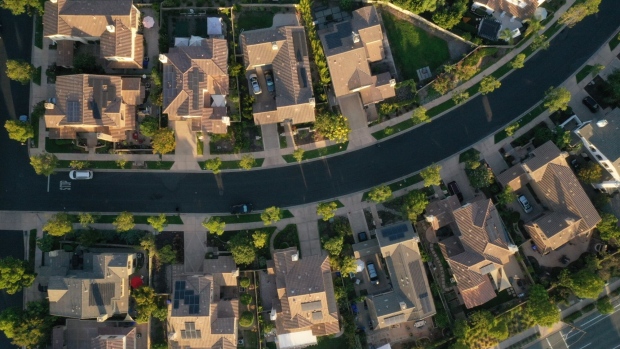 Single-family homes are seen in this aerial photograph taken over a Lennar Corp. development in San Diego, California, U.S., on Tuesday, Sept. 1, 2020. U.S. sales of previously owned homes surged by the most on record in July as lower mortgage rates continued to power a residential real estate market that’s proving a key source of strength for the economic recovery.