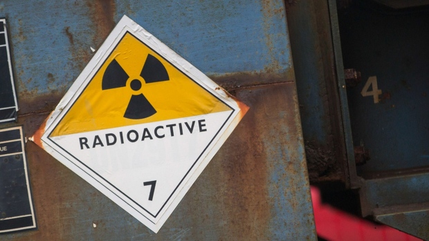A radioactive warning sign sits on the side of a railway goods wagon parked in the sidings of Sellafield atomic fuel reprocessing site, operated by Sellafield Ltd., in Seascale, U.K., on Monday, Dec. 19, 2016. Photographer: Matthew Lloyd/Bloomberg