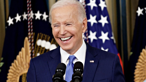 US President Joe Biden smiles during a news conference in the State Dining Room of the White House in Washington, DC, US, on Wednesday, Nov. 9, 2022. Biden is speaking following a midterm election in which Democrats fared better than expected and avoided a worst-case scenario in Tuesday night's vote as a feared Republican wave failed to materialize.