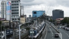 The Metro Rail Transit train travels along a track in Makati City, Metro Manila, the Philippines, on Monday, Aug. 15, 2022. Bangko Sentral ng Pilipinas delivered an off-cycle rate increase of 75 basis points last month to tame inflation that’s almost at a four-year high and prop up the weakening peso.