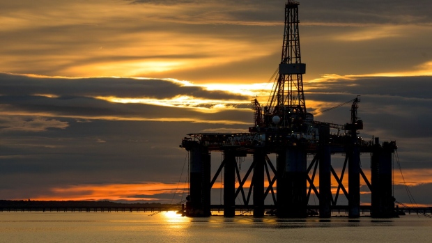 The Well-Safe Guardian plug and abandonment rig, operated by Well-Safe Solutions Ltd, stands in the Port of Cromarty Firth during sunrise in Cromarty, U.K., on Tuesday, June 23, 2020. Oil headed for a weekly decline -- only the second since April -- as a surge in U.S. coronavirus cases clouded the demand outlook, though the pessimism was tempered by huge cuts to Russia's seaborne crude exports. Photographer: Jason Alden/Bloomberg