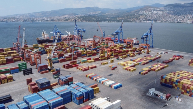 Ship-to-shore cranes and shipping containers at the commercial Port of Izmir in Izmir, Turkey, on Friday, May 19, 2023. Turkey’s lira is heading for its worst week since July as the country prepares for a runoff presidential vote in 10 days, as the cost of insuring government bonds against default increases further.