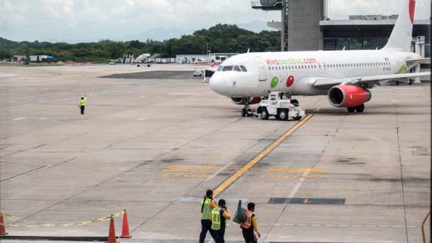 A Grupo Viva Aerobus SAB plane sits on the tarmac at Licenciado Gustavo Diaz Ordaz International Airport (PVR) in Puerto Vallarta, Mexico, on Friday, Aug. 25, 2017.