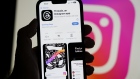 The Threads app, operated by Meta Platforms Inc., on a smartphone, besides an Instagram Inc. logo, arranged in Madrid, Spain, on Tuesday, July 5, 2023.  Photographer: Paul Hanna/Bloomberg