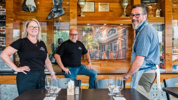 The new owners of the rebuilt Musi-Café. From left: Katie Stapels, Martin Lacombe and David Biron.