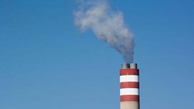 A chimney flue vents steam at the Eskom Holdings SOC Ltd. Kusile coal-fired power station in Mpumalanga, South Africa, on Friday, May 5, 2023. Debt-strapped Eskom is currently implementing daily blackouts because its dilapidated power plants are unable to supply enough electricity to meet demand and it doesn’t have the money to invest in capital equipment. Photographer: Waldo Swiegers/Bloomberg