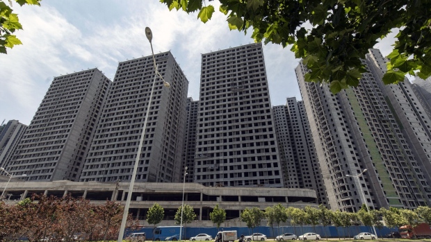 Residential buildings under construction in Zhengzhou, Henan province, China. Photographer: Qilai Shen/Bloomberg