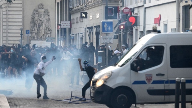 Protesters clash with CRS riot police in Marseille, on June 30. Photographer: Christophe Simon/AFP/Getty Images