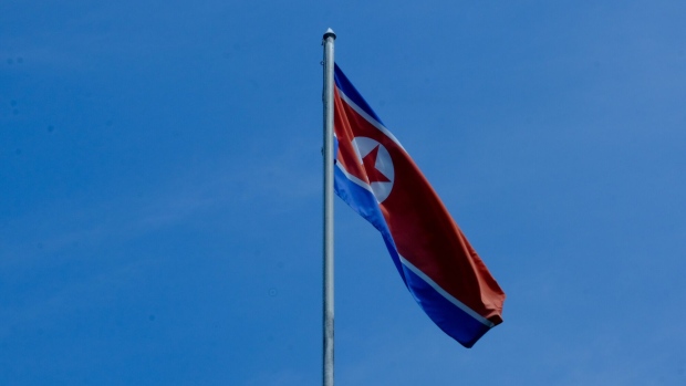 A North Korean flag flies at the Embassy of North Korea compound in Kuala Lumpur, Malaysia, on Saturday, March 20, 2021. Kim Jong Un’s regime cut off diplomatic relations with Malaysia, accusing it of a “super-large hostile act” after its top court ruled a North Korean man can be extradited to the U.S. face money-laundering charges. Photographer: Samsul Said/Bloomberg