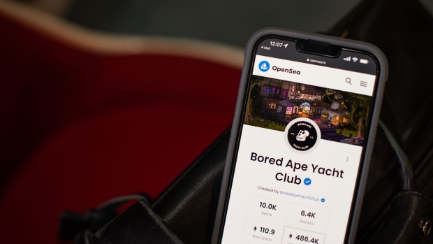The Bored Ape Yacht Club non-fungible token (NFT) collection on the OpenSea marketplace on a smartphone arranged in Hastings-on-Hudson, New York, U.S., on Friday, April 8, 2022. The Bored Ape Yacht Club tokens, which have been limited to 10,000, have been at the forefront of the NFT craze, rising several times in value since their release in April 2021 and by 73% this year, according to CoinGecko, a cryptocurrency aggregator.