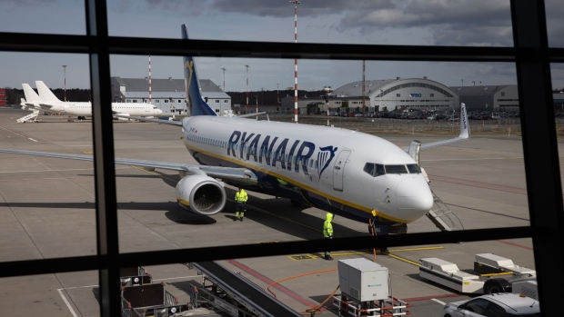 A Boeing 737 NG Max, operated by Ryanair Holdings Plc, at Riga International Airport in Riga, Latvia, on Tuesday, March 28, 2023. The summer travel season is shaping up to be a good one for European airlines, prompting Deutsche Bank AG and Barclays Plc to upgrade several carriers that could benefit from rising fares, strong demand and lower jet fuel prices. Photographer: Andrey Rudakov/Bloomberg