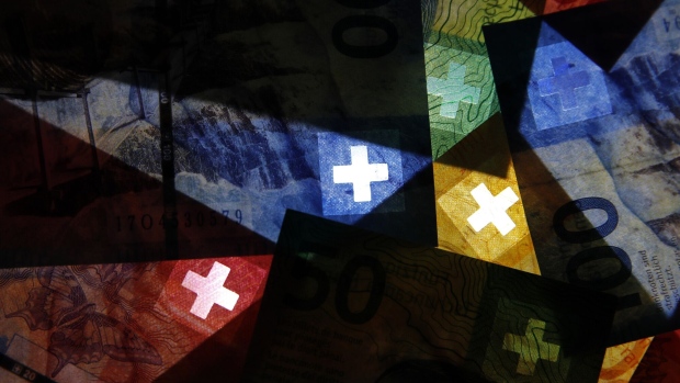 Swiss franc banknotes. Photographer: Stefan Wermuth/Bloomberg