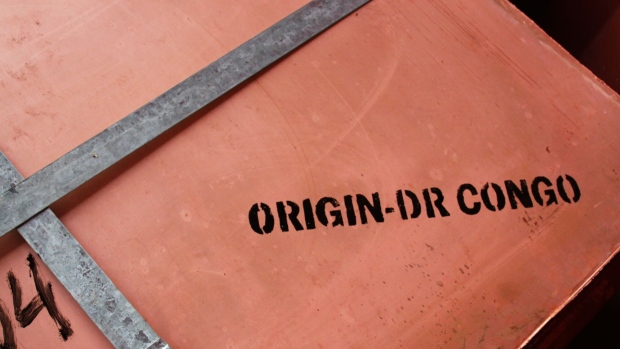 An 'Origin-DR Congo' stamp on copper cathode sheets ready for export via trucks at the Etoile open-pit copper mine, operated by Chemaf Sarl, in Katanga province near Lubumbashi, the Democratic Republic of Congo, on Tuesday, Dec. 21, 2021. Along a 250-mile highway which cuts through central Africa, thousands of flatbed trucks haul sheets of copper and sacks of cobalt hydroxide, essential for electric cars and other 21st century technologies for which drivers must pay steep tolls, as much as $900 for a round trip. Photographer: Lucien Kahozi/Bloomberg