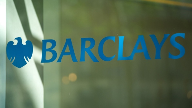 A logo at the entrance to the Barclays Plc French headquarters in Paris, France, on Wednesday, May 17, 2023. Barclays Plc expects to increase its headcount in Paris by about two thirds in the next two to three years, as the French capital increasingly becomes the main trading hub in continental Europe for global lenders after Brexit. Photographer: Nathan Laine/Bloomberg