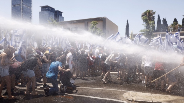 Police trying to disperse protesters in Tel Aviv on July 11.