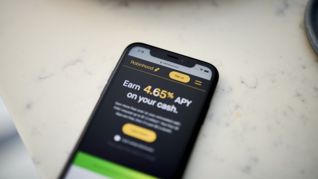 The Robinhood website on a smartphone arranged in the Brooklyn borough of New York, US, on Monday, May 8, 2023. Robinhood Markets Inc. is scheduled to release earnings figures on May 10. Photographer: Gabby Jones/Bloomberg
