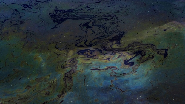 An oil spill floating on water. Photographer: Bloomberg Creative Photos/Bloomberg