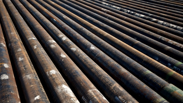 Drill pipes at a natural gas site  Photographer: Matt Nager/Bloomberg