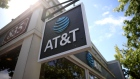 SAN RAFAEL, CALIFORNIA - MAY 17: A sign is posted in front of an AT&T retails store on May 17, 2021 in San Rafael, California. AT&T, the world’s largest telecommunications company, announced a deal with Discovery, Inc. which will spin off AT&T's WarnerMedia and be combined with Discovery to create a new standalone media company. (Photo by Justin Sullivan/Getty Images)
