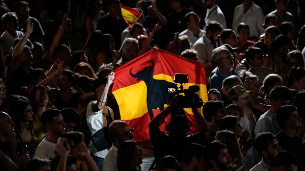 Supporters of Alberto Nunez Feijoo, leader of the People's Party, during an election night rally at party headquarters in Madrid, Spain, on Sunday, July 23, 2023. Feijoo had looked set to oust Spanish Prime Minister Pedro Sanchez when a polling blackout began on Tuesday, but Sanchez boosted his support during the final days of the election campaign to deny his right-wing opponents a majority in parliament.