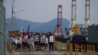 Striking International Longshore and Warehouse Union Canada workers 