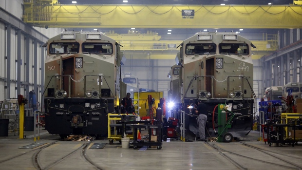 General Electric Co. (GE) Evolution Series Tier 4 diesel locomotives stand on the final assembly line at the GE Manufacturing Solutions facility in Fort Worth, Texas, U.S., on Tuesday, Oct. 25, 2016. The U.S. Census Bureau is scheduled to release durable goods figures on October 27.