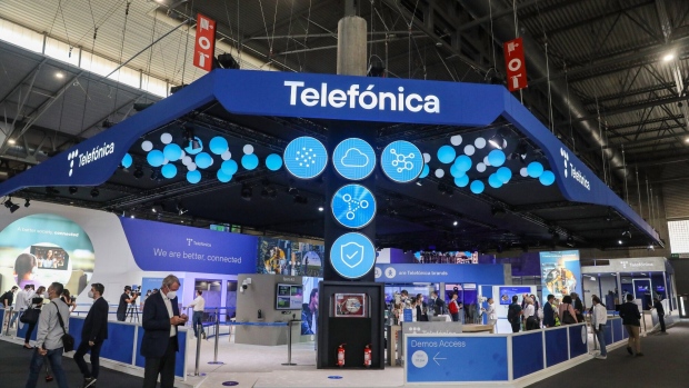 A Telefonica logo above the Telefonica SA stand on the opening day of the MWC Barcelona at the Fira de Barcelona venue in Barcelona, Spain, on Monday, June 28, 2021. MWC Barcelona, which in 2019 attracted 109,000 attendees from 198 countries, was one of the first major European conference casualties due to the pandemic when it was axed in February last year.