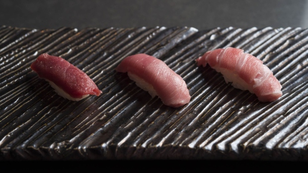 A fancy flight of tuna at a New York sushi counter.