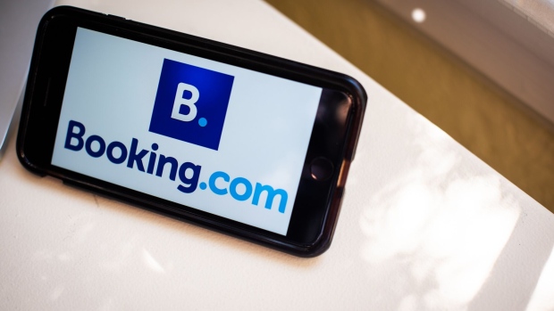 The Booking.com logo on a mobile phone arranged in Dobbs Ferry, New York, U.S., on Saturday, May 1, 2021. Booking Holdings Inc. is scheduled to release earnings figures on May 5. Photographer: Tiffany Hagler-Geard/Bloomberg