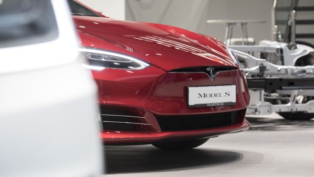 A Tesla Model S electric automobile sits on display inside a Tesla Inc. store in Frankfurt, Germany, on Friday, Aug. 11, 2017. Germany's government wants carmakers to increase efforts to reach its goal of 1 million electric vehicles on German roads by 2020, Steffen Seibert, Chancellor Angela Merkel’s spokesman, told reporters today in Berlin.