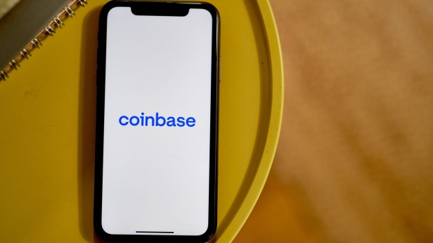 The Coinbase logo on a smartphone arranged in the Brooklyn borough of New York, US, on Wednesday, June 7, 2023. The list of digital tokens deemed as unregistered securities by the Securities and Exchange Commission now spans over $120 billion of crypto after the US agencys lawsuits against Binance Holdings Ltd. and Coinbase Global Inc.