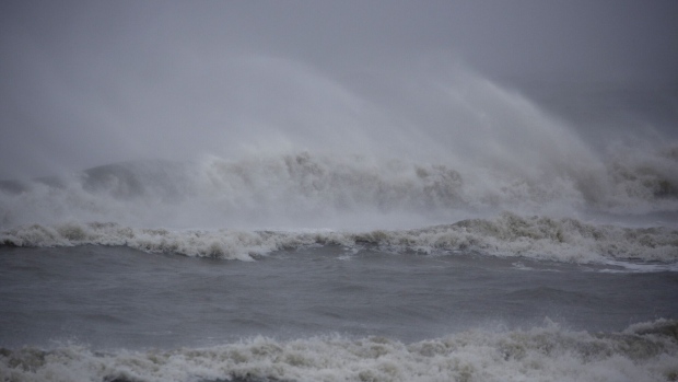 Waves break on the beach during Hurricane Dorian in Folly Beach, South Carolina, U.S. Photographer: Bloomberg Creative Photos/Bloomberg