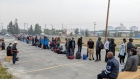 People lining up for flight out of Yellowknife