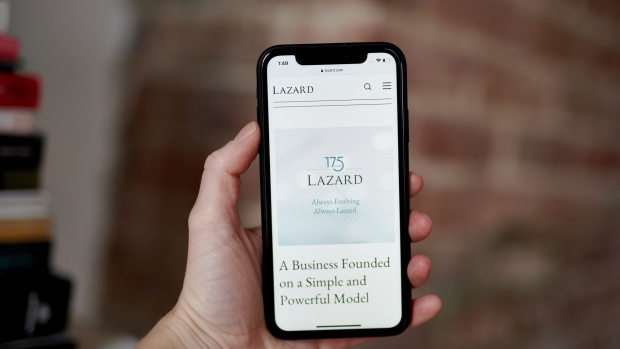 The Lazard website on a smartphone arranged in the Brooklyn borough of New York, US, on Friday, April 28, 2023. Lazard Ltd. posted a surprise loss for the first quarter and said it plans to reduce its workforce by 10% this year, predicting the industrys dealmaking slump will last through 2023. Photographer: Gabby Jones/Bloomberg