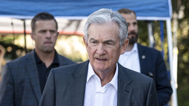Jerome Powell, chairman of the US Federal Reserve, walks the grounds at the Jackson Hole economic symposium in Moran, Wyoming, US, on Friday, Aug. 25, 2023. Powell said the US central bank is prepared to raise interest rates further if needed and intends to keep borrowing costs high until inflation is on a convincing path toward the Fed's 2% target.