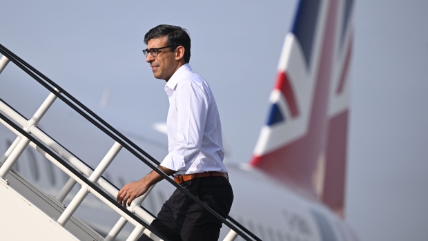 STANSTED, ESSEX - MARCH 12: Prime Minister Rishi Sunak boards a plane at Stansted Airport as he departs for the AUKUS Meeting in San Diego on March 12, 2023 in Stansted, Essex. President Biden hosts British Prime Minister Rishi Sunak and Australian Prime Minister Anthony Albanese in San Diego for an AUKUS meeting to discuss the procurement of nuclear-powered submarines under a pact between the three nations. (Photo by Leon Neal - WPA Pool/Getty Images)