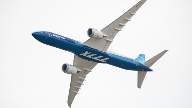 A Boeing 777-9, a variant of the 777X, performs a flying display at the Paris Air Show in Le Bourget, Paris, France, on Monday, June 19, 2023. At the Paris Air Show, airlines and leasing companies will place orders, manufacturers will show off civil and military aircraft, and executives will tout new technologies like flying taxis and electric propulsion as the industry pushes toward decarbonization.