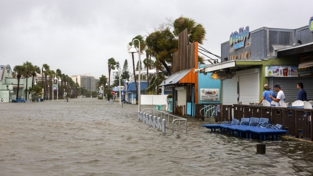 A flooded street in Gulfport, Florida, on Wednesday.  Photographer: Juan Manuel Barrero Bueno/Bloomberg