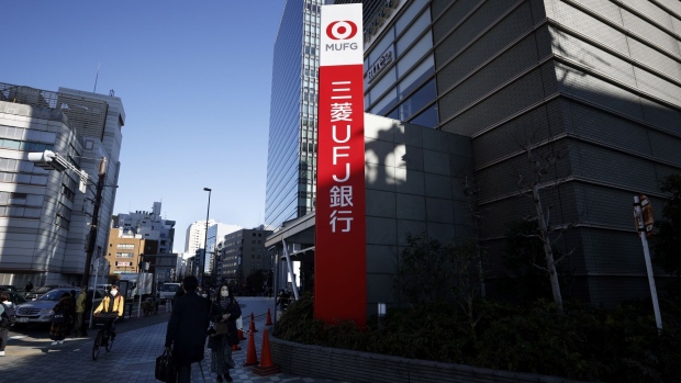 Signage for MUFG Bank Ltd., a unit of Mitsubishi UFJ Financial Group Inc. (MUFG), displayed outside a branch in Tokyo, Japan, on Monday, Jan. 31, 2022. Mitsubishi UFJ Financial Group is scheduled to release its third-quarter earnings announcement on February 2.