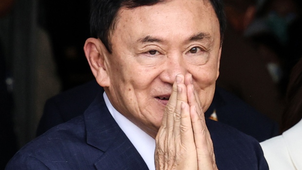 Thaksin Shinawatra, Thailand's former prime minister, arrives at Don Mueang airport after returning from self-exile in Bangkok, Thailand, on Tuesday, Aug. 22, 2023. Thaksin, who faced three guilty sentences for corruption cases handed down in absentia, was ordered by the Supreme Court today to serve a total of eight years in jail.