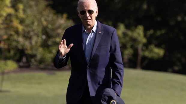 US President Joe Biden walks on the South Lawn of the White House after arriving on Marine One in Washington, DC, US, on Monday, Sept. 4, 2023.  Photographer: Michael Reynolds/EPA/Getty Images