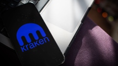 The Kraken logo on a smartphone arranged in Hastings-on-Hudson, New York, US, on Friday, Feb. 10, 2023. Kraken will pay $30 million to settle Securities and Exchange Commission allegations that it broke the agency’s rules with its cryptoasset staking products and will discontinue them in the US as part of the agreement with the regulator.